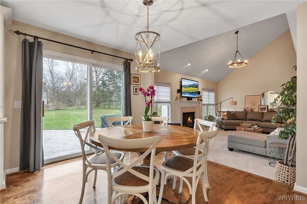 Dining room, Fireplace, Interior, Living room, Pendant Lights, Recessed Lighting, Wood Texture Flooring