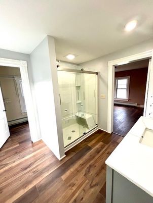 Bathroom, Glass Shower, Interior, Recessed Lighting, Wood Texture Flooring