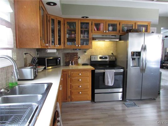 Interior, Kitchen, Stainless Steel Appliances, Tile Countertops, Wood Texture Flooring