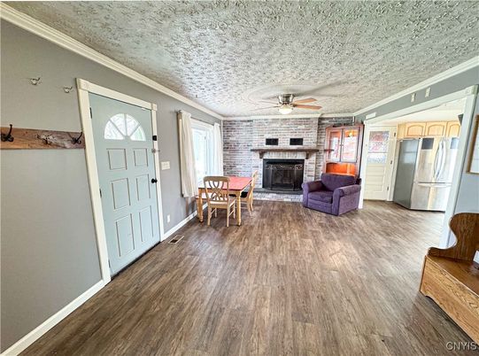 Dining room, Fireplace, Interior, Kitchen, Living room, Stone Walls, Wood Texture Flooring