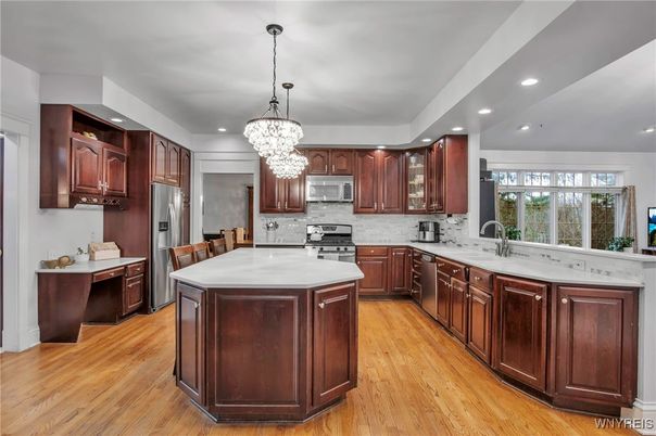 Chandelier, Interior, Kitchen, Pendant Lights, Recessed Lighting, Stainless Steel Appliances, Wood Texture Flooring