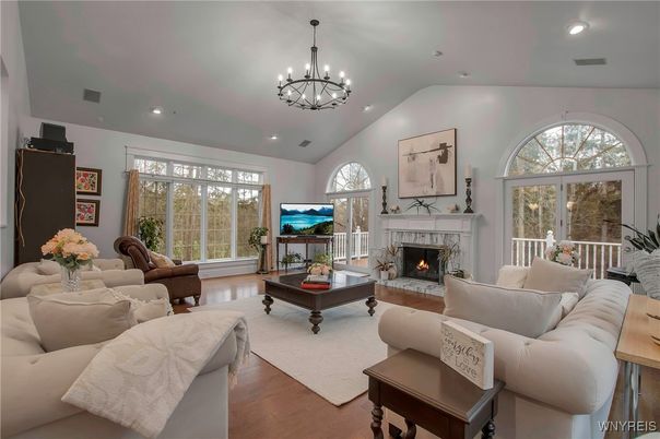 Chandelier, Fireplace, Interior, Living room, Recessed Lighting, Wood Texture Flooring