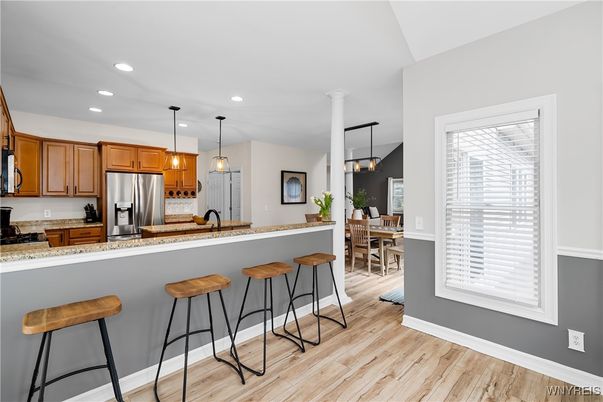 Dining room, Interior, Kitchen, Pendant Lights, Recessed Lighting, Stainless Steel Appliances, Wood Texture Flooring