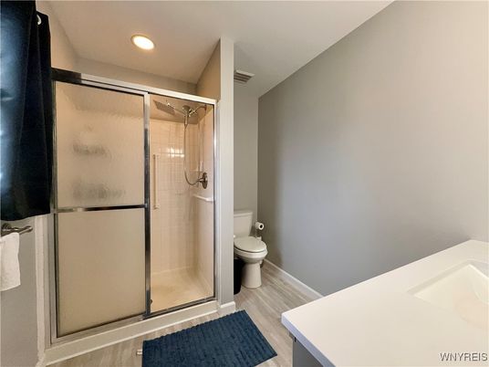 Bathroom, Glass Shower, Interior, Recessed Lighting, Wood Texture Flooring