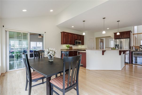 Dining room, Interior, Kitchen, Pendant Lights, Recessed Lighting, Stainless Steel Appliances, Wood Texture Flooring