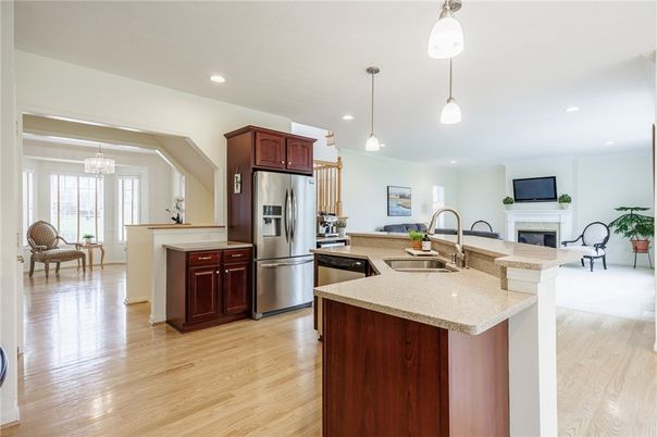 Fireplace, Interior, Kitchen, Pendant Lights, Recessed Lighting, Stainless Steel Appliances, Wood Texture Flooring