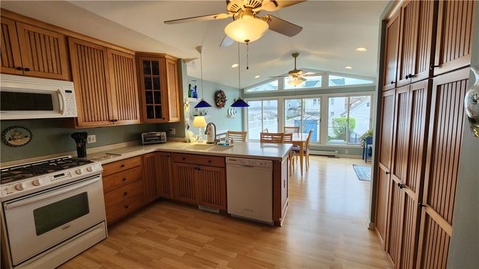 Dining room, Interior, Kitchen, Recessed Lighting, Stainless Steel Appliances, Wood Texture Flooring