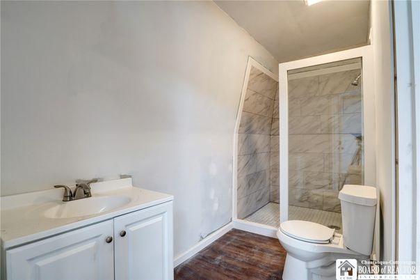 Bathroom, Glass Shower, Interior, Marble Walls, Wood Texture Flooring
