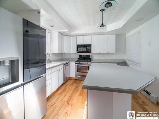 Interior, Kitchen, Pendant Lights, Stainless Steel Appliances, Wood Texture Flooring