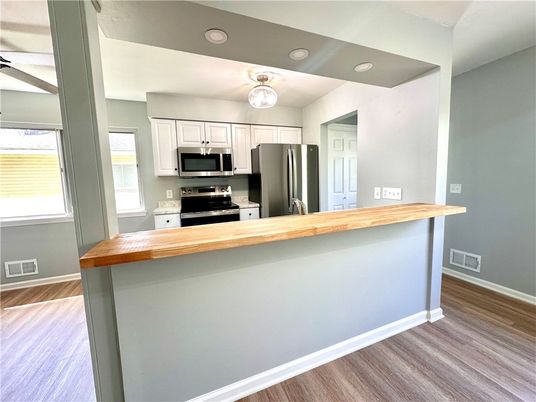 Interior, Kitchen, Recessed Lighting, Stainless Steel Appliances, Wood Texture Flooring
