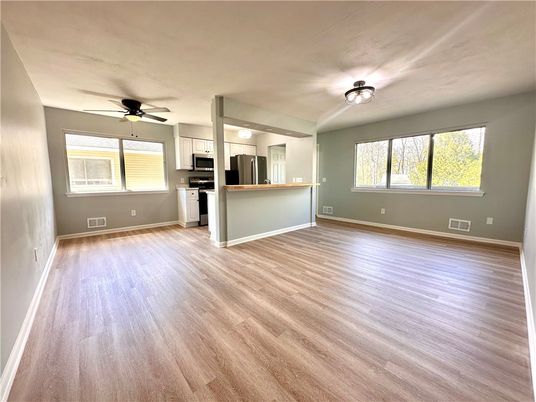Empty room, Interior, Kitchen, Stainless Steel Appliances, Wood Texture Flooring