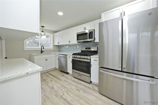 Interior, Kitchen, Pendant Lights, Recessed Lighting, Stainless Steel Appliances, Wood Texture Flooring