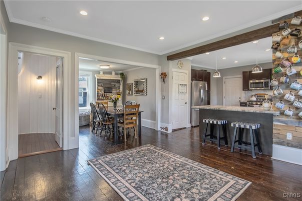 Dining room, Interior, Kitchen, Pendant Lights, Recessed Lighting, Stainless Steel Appliances, Wood Texture Flooring