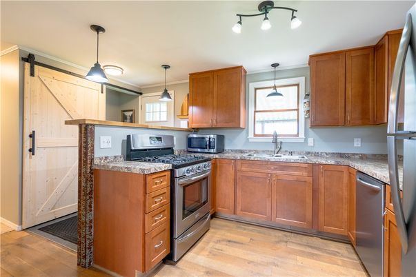 Interior, Kitchen, Pendant Lights, Stainless Steel Appliances, Wood Texture Flooring
