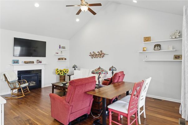 Dining room, Fireplace, Interior, Living room, Recessed Lighting, Wood Texture Flooring