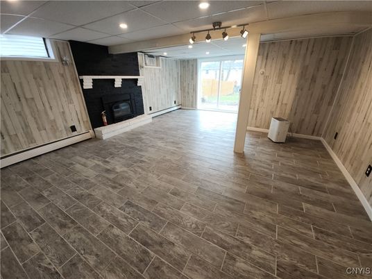Empty room, Fireplace, Interior, Recessed Lighting, Wood Texture Flooring, Wooden Walls