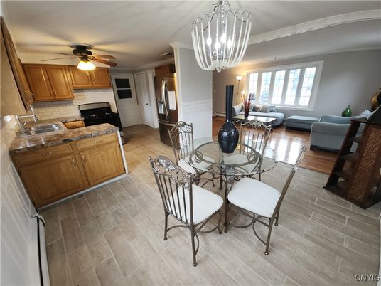Chandelier, Dining room, Interior, Kitchen, Living room, Stone Walls, Wood Texture Flooring