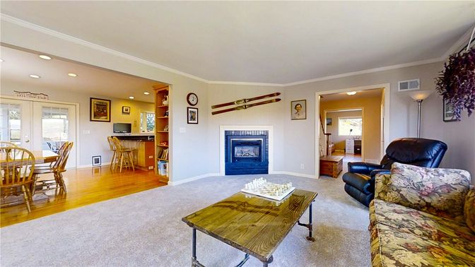 Dining room, Fireplace, Interior, Living room, Recessed Lighting, Wood Texture Flooring