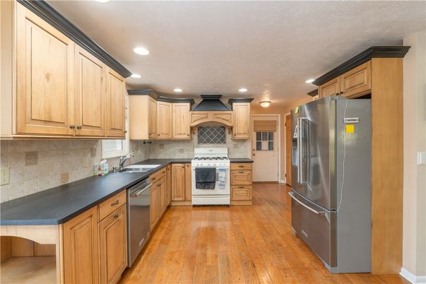 Interior, Kitchen, Recessed Lighting, Stainless Steel Appliances, Wood Texture Flooring