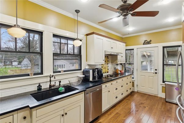Interior, Kitchen, Pendant Lights, Recessed Lighting, Stainless Steel Appliances, Wood Texture Flooring