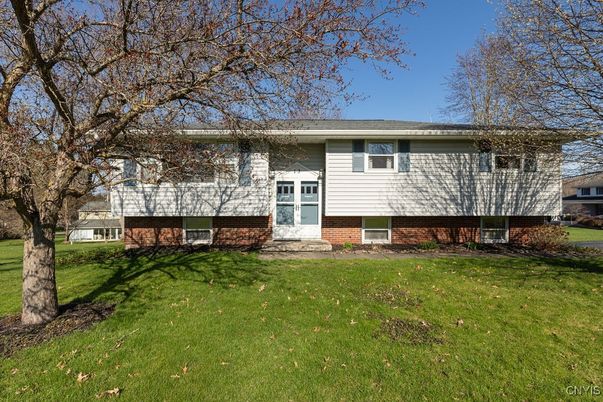 Exterior, Facade, Brick Facade, Raised Ranch