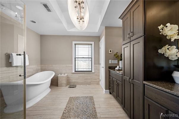 Bathroom, Chandelier, Free Standing Baths, Interior, Pendant Lights, Wood Texture Flooring