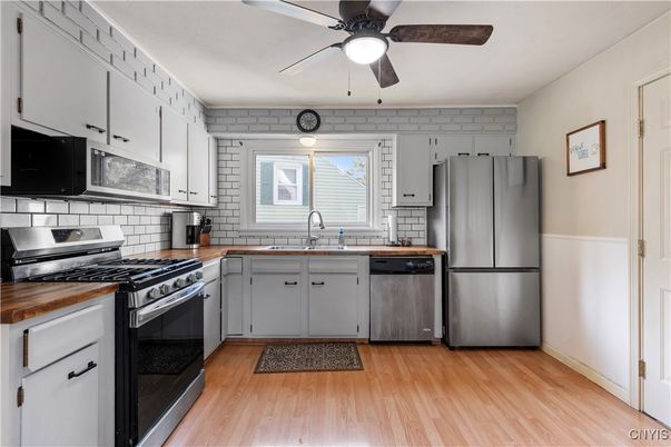Interior, Kitchen, Stainless Steel Appliances, Stone Walls, Wood Texture Flooring