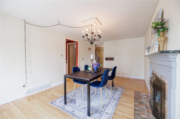 Chandelier, Dining room, Fireplace, Interior, Wood Texture Flooring