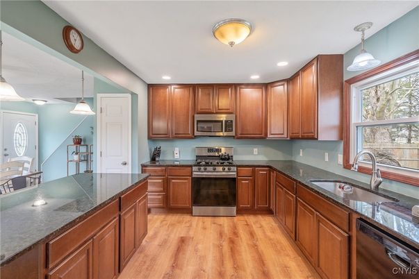 Interior, Kitchen, Pendant Lights, Recessed Lighting, Stainless Steel Appliances, Wood Texture Flooring