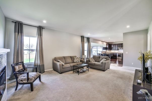 Fireplace, Interior, Kitchen, Living room, Recessed Lighting, Stainless Steel Appliances, Wood Texture Flooring