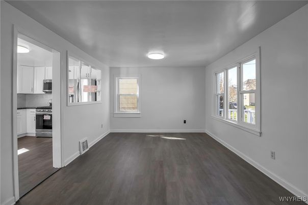 Empty room, Interior, Kitchen, Stainless Steel Appliances, Wood Texture Flooring