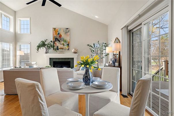 Dining room, Fireplace, Interior, Living room, Recessed Lighting, Wood Texture Flooring