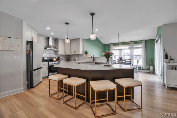 Dining room, Interior, Kitchen, Pendant Lights, Recessed Lighting, Stainless Steel Appliances, Wood Texture Flooring