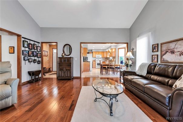 Dining room, Interior, Kitchen, Living room, Pendant Lights, Recessed Lighting, Stainless Steel Appliances, Wood Texture Flooring