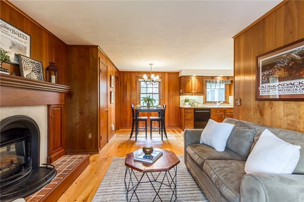 Chandelier, Dining room, Fireplace, Interior, Living room, Wood Texture Flooring, Wooden Walls