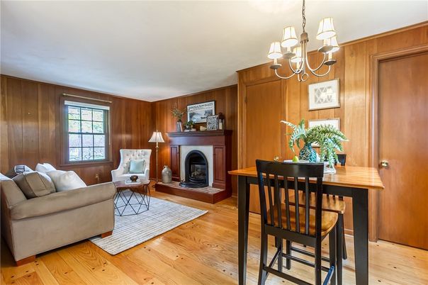 Chandelier, Dining room, Fireplace, Interior, Living room, Wood Texture Flooring, Wooden Walls