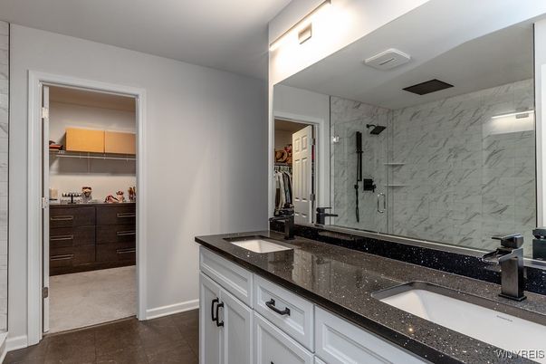 Bathroom, Dual Sink Vanities, Glass Shower, Interior, Marble Walls, Walk-in Closets