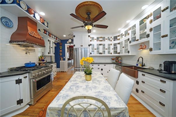 Dining room, Interior, Kitchen, Recessed Lighting, Stainless Steel Appliances, Wood Texture Flooring