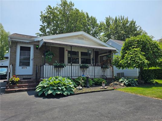 Exterior, Facade, Brick Facade, Log Home