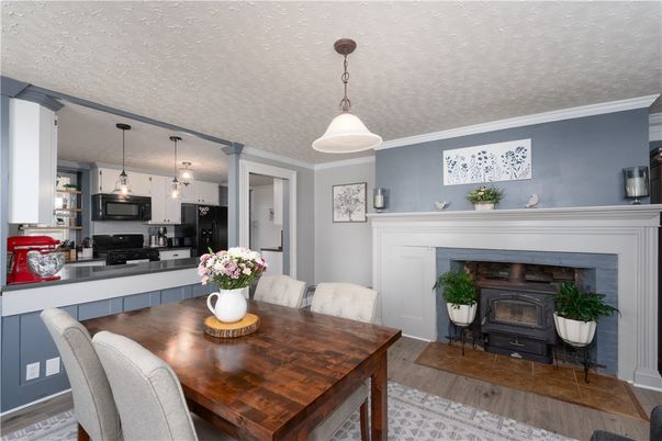 Dining room, Fireplace, Interior, Kitchen, Pendant Lights, Wood Texture Flooring
