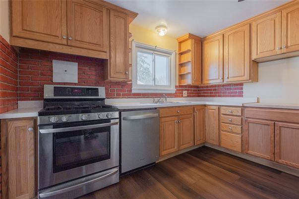 Interior, Kitchen, Stainless Steel Appliances, Stone Walls, Wood Texture Flooring