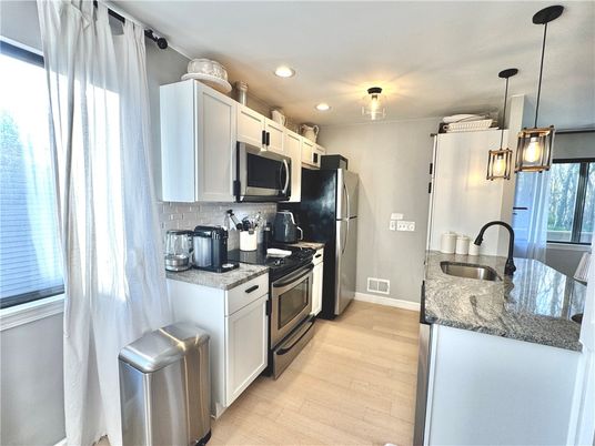 Interior, Kitchen, Pendant Lights, Recessed Lighting, Stainless Steel Appliances, Wood Texture Flooring