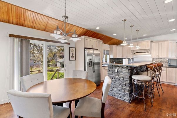 Dining room, Interior, Kitchen, Pendant Lights, Recessed Lighting, Stainless Steel Appliances, Wooden Ceilings, Wood Texture Flooring