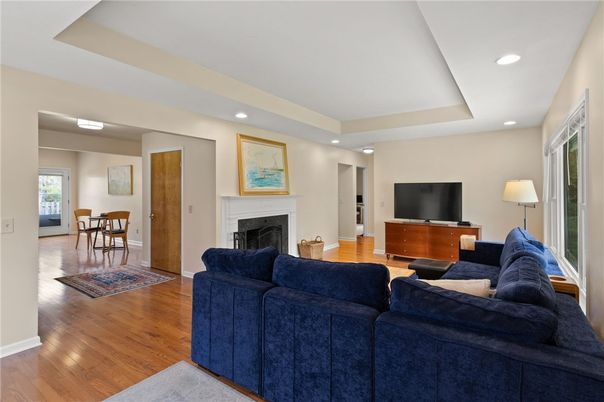 Dining room, Fireplace, Interior, Living room, Recessed Lighting, Wood Texture Flooring