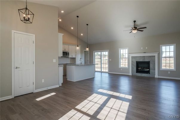 Empty room, Fireplace, Interior, Kitchen, Pendant Lights, Recessed Lighting, Wood Texture Flooring