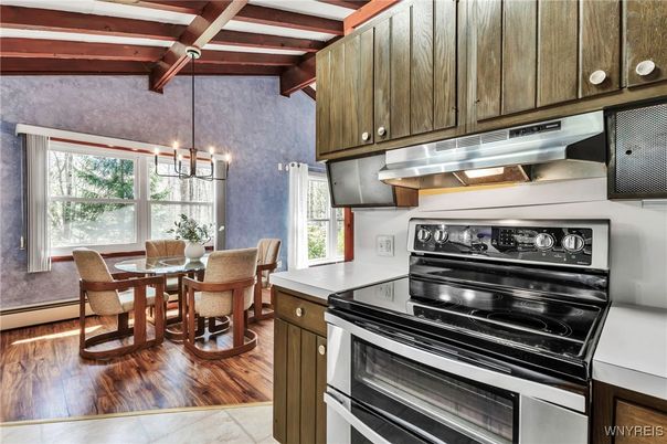 Dining room, Interior, Kitchen, Pendant Lights, Stainless Steel Appliances, Wooden Beams, Wood Texture Flooring