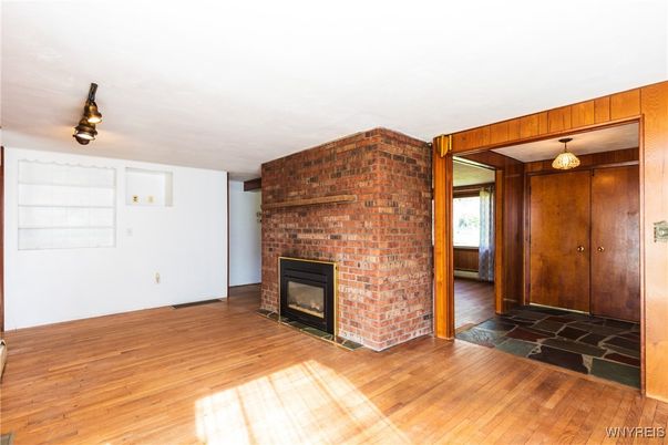Empty room, Fireplace, Interior, Stone Walls, Wood Texture Flooring
