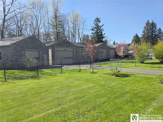 Attached, Backyard, Exterior, Facade, Brick Facade, Ranch
