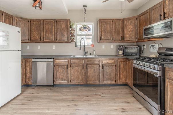 Interior, Kitchen, Pendant Lights, Stainless Steel Appliances, Wood Texture Flooring