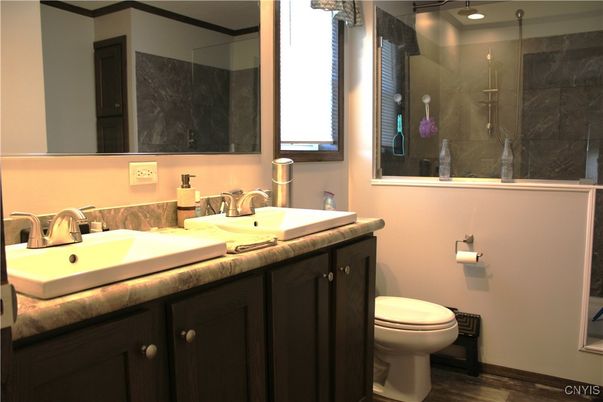 Bathroom, Dual Sink Vanities, Glass Shower, Interior, Wood Texture Flooring